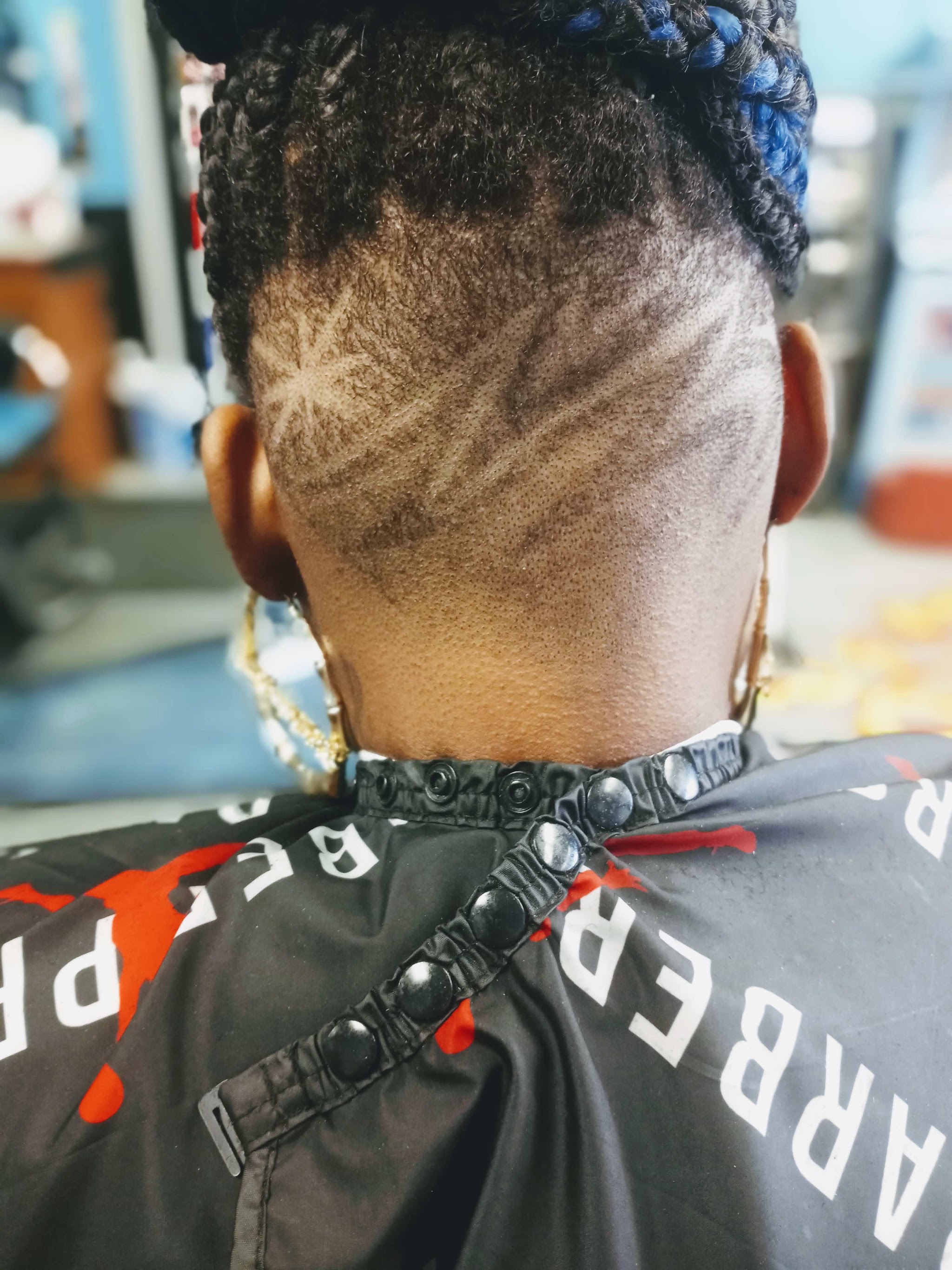 A detailed design cut into the back of the head